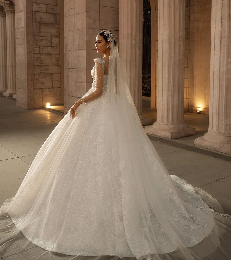 Bride standing in a white wedding dress Bride standing in a white wedding dress